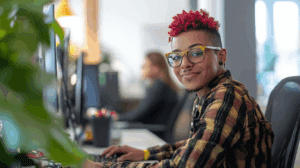 Trans person working at their office desk