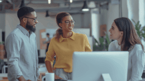 Colleagues working together on a project in the office